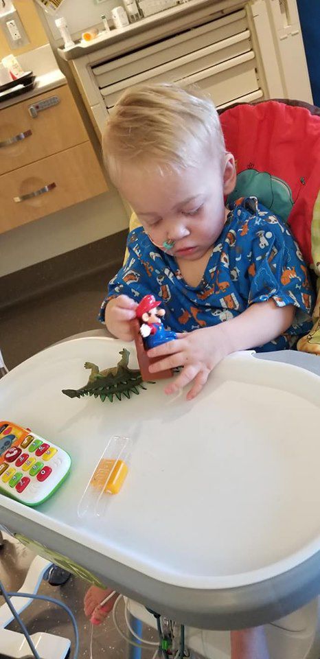 Barrett plays with toys